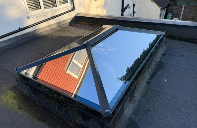 Residential roof lantern skylight fitted with reflective solar control window film, reducing heat gain and glare while maintaining natural daylight inside the property